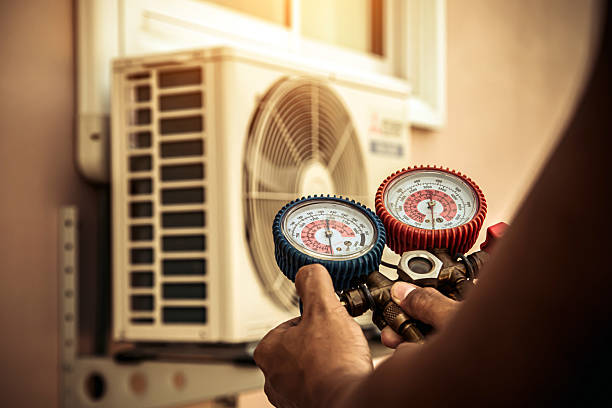 Professional Heat Pump Repair technician working in Triangle, VA